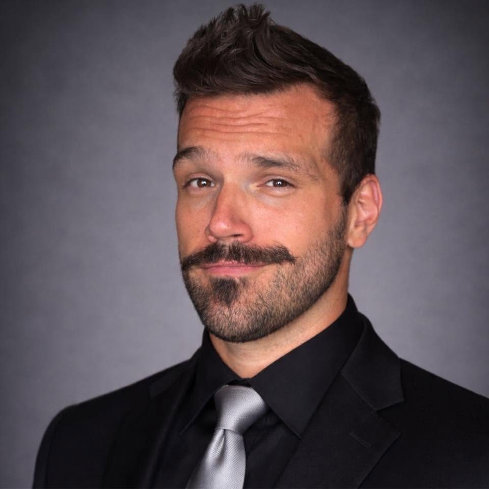 Headshot of Austin Jauregui, co-founder of Curtsy Collective
